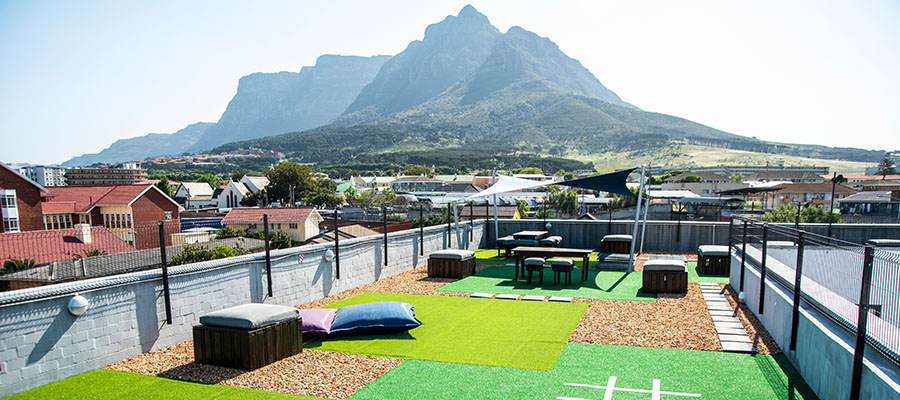 rooftop chill area with view of Table Mountain