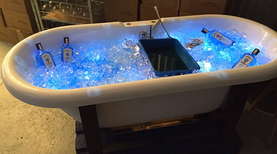 bathtub filled with ice for ice bucket and lit with blue leds