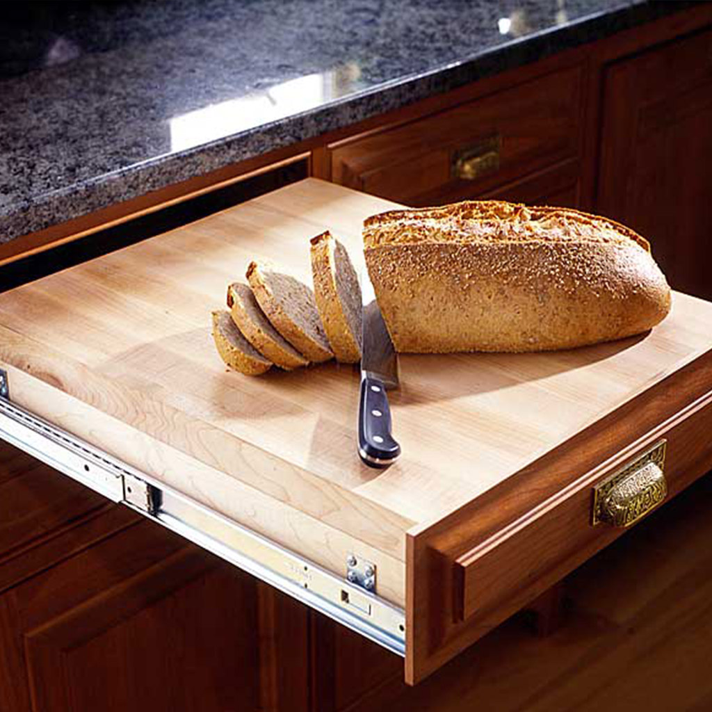 cutting board over drawer to create extra kitchen surface space