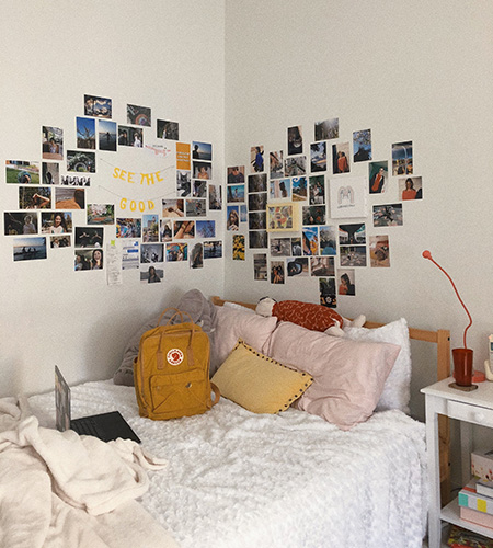 pictures on wall of dorm room